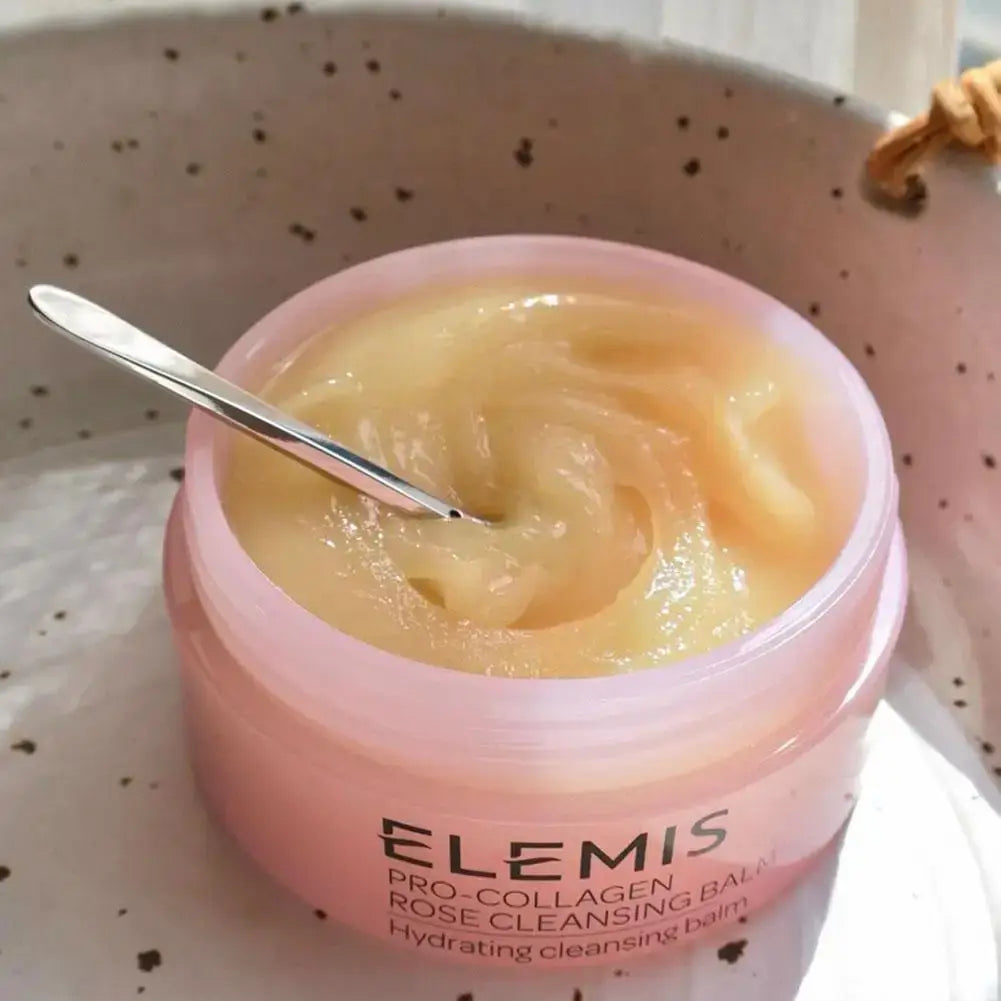 Elemis Cleansing Balm Deep Clean,Anti-Wrinkle& Soothing Makeup Remover in a pink jar with a silver spoon.